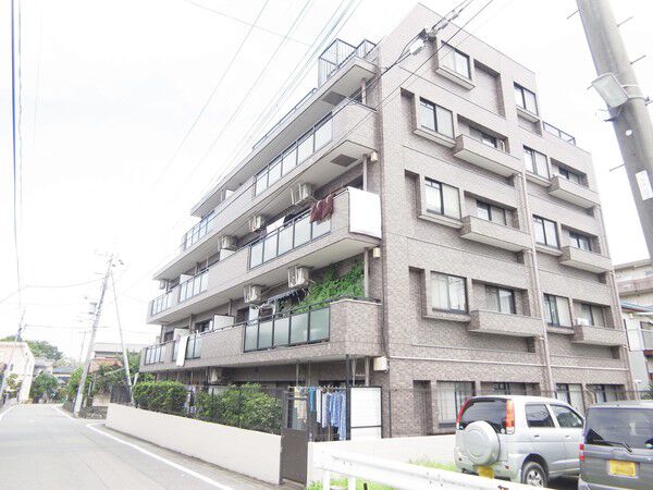 【ドラゴンマンション橋本七番館】外観はブラウンのタイル貼